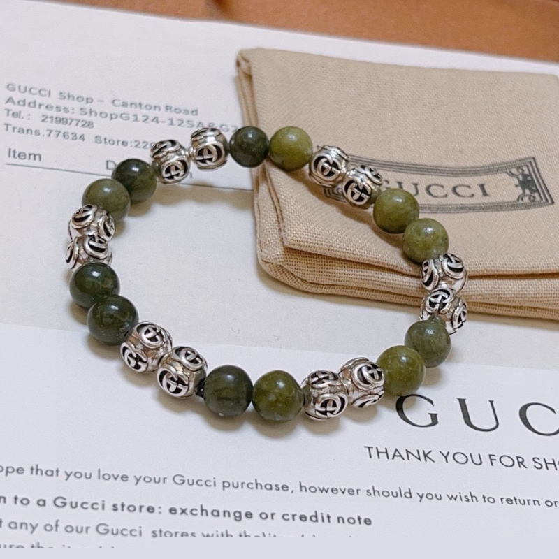 G*u*i bracelets